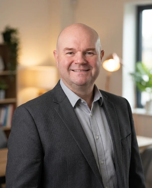 AI Musician Headshot of a 50 man by ExecHeadshots