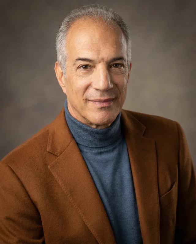 AI Therapist Headshot of a 60 man by ExecHeadshots