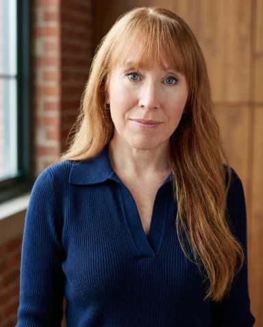 AI Trainer Headshot of a 45 woman by ExecHeadshots