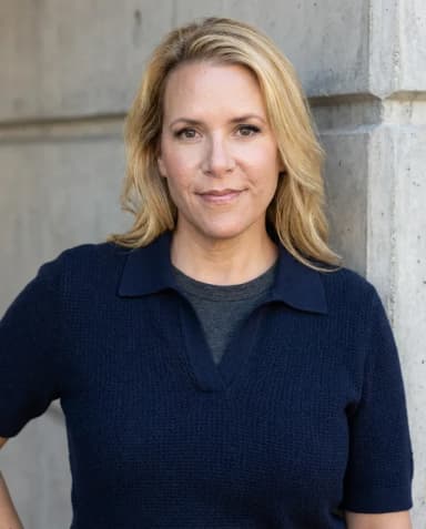 AI Trainer Headshot of a 50 woman by ExecHeadshots