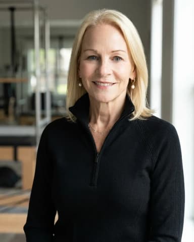 AI Trainer Headshot of a 60 woman by ExecHeadshots