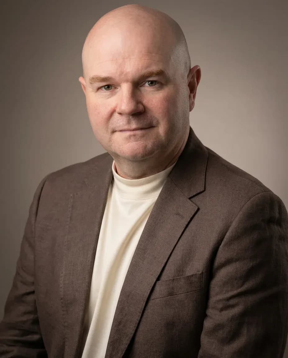 AI Writer Headshot of a 50 man by ExecHeadshots